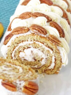 Banana Cake Roll: sweet, fruity, tangy and delicious. Great combo of lemony filling, pecan decor and banana dough. | olgainthekitchen.com