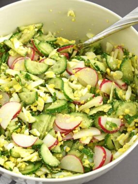 Cucumber Radish Salad is fresh, creamy and crunchy. The combo of fresh cucumbers, radishes and boiled eggs not only bring a crunchy texture, but also a beautiful vibrant color to this salad. | olgainthekitchen.com
