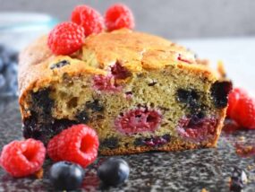 Banana Berries Bread: incredibly moist loaf of banana bread loaded with juicy and fresh blueberries and raspberries with a hint of orange. | olgainthekitchen.com