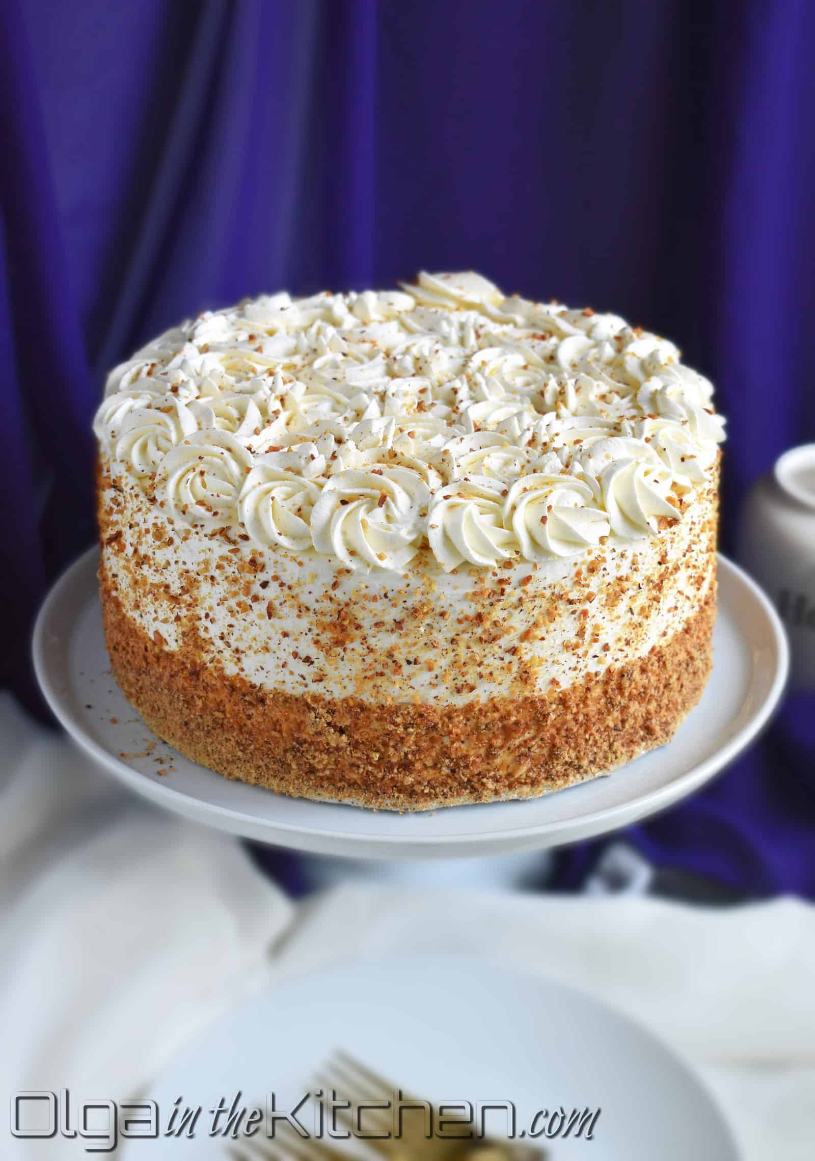Honey Cake: nice, fluffy texture, moist with a hint of nutty flavor. The honey gives the cake sweetness; a delicious combination with sour cream frosting. This cake just hits ‘the spot’. | olgainthekitchen.com 