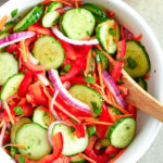 Crisp Cucumber Salad: crunchy, crispy texture with a touch of sweetness. The combination of fresh veggies will make you crave this salad all-summer long. | olgainthekitchen.com