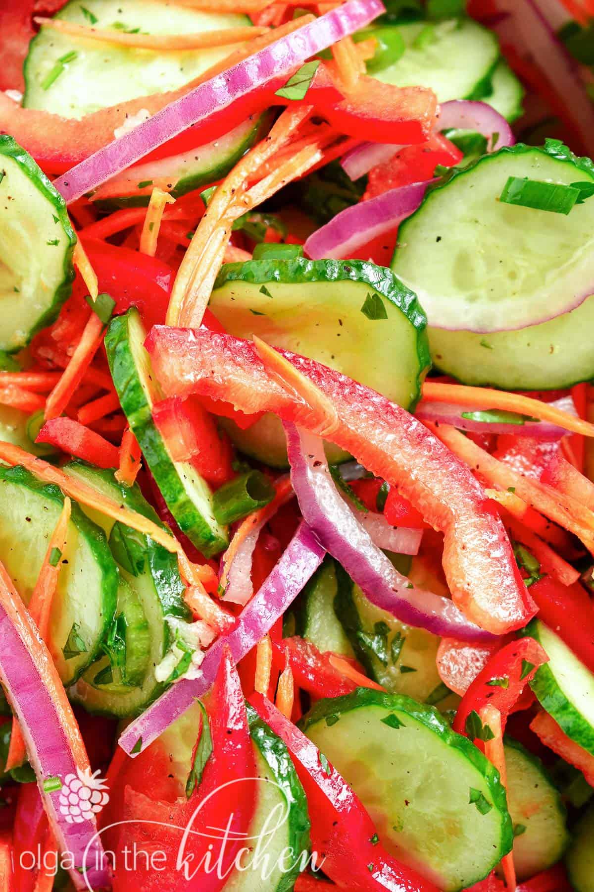 Crisp Cucumber Salad: crunchy, crispy texture with a touch of sweetness. The combination of fresh veggies will make you crave this salad all-summer long. | olgainthekitchen.com