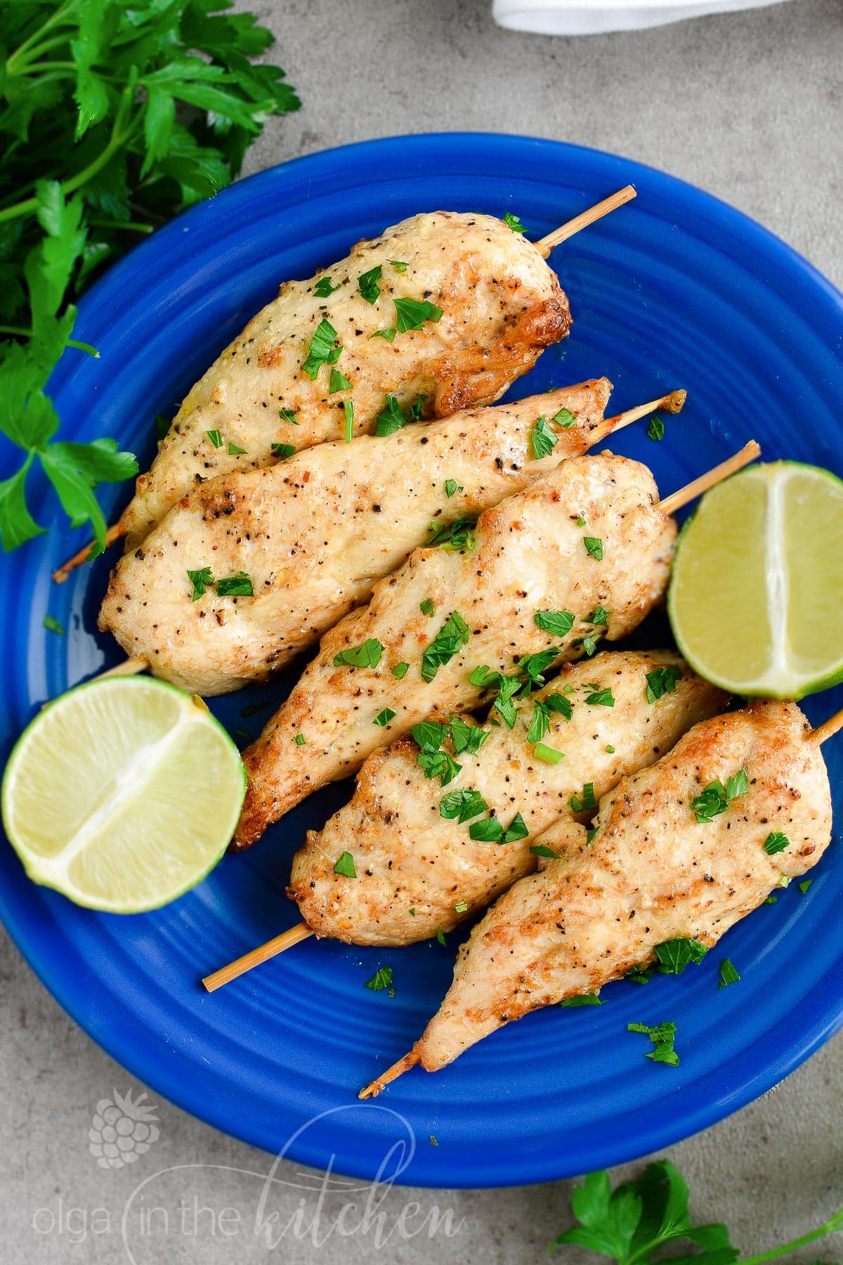 Marinated Baked Chicken Tenderloins are super easy to make, so tender and are one of those recipes that kids and adults love. The chicken marinade ingredients are simple with the minimal prep. #chicken #chickentenders #chickentenderloins #olgainthekitchen #videorecipe #video #dinner #grilling #summer