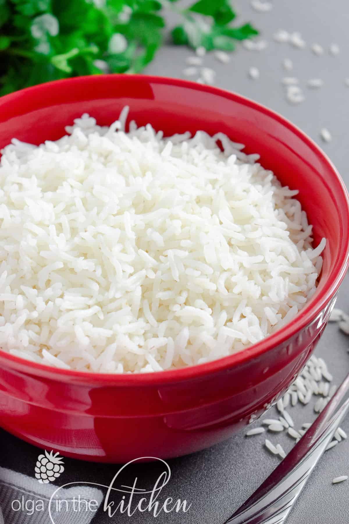 Learn how to cook perfect rice every time. This is our go-to simple, but reliable stove-top method of How to Cook White Rice to achieve perfectly tender and fluffy texture every time. #howtocookrice #whiterice #longgrainrice #basmatirice #jasminerice #olgainthekitchen #rice #sidedish #howto