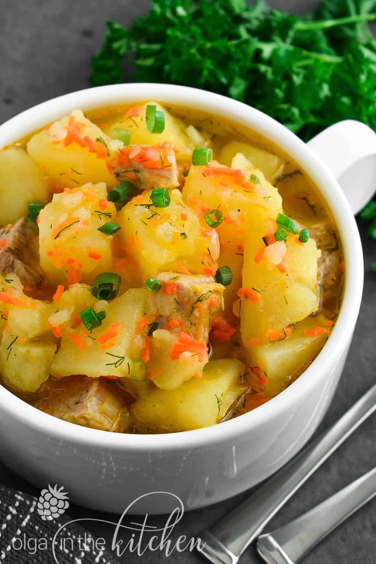 Braised Potatoes with Pork: chunks of potatoes and tender-juicy meat coated in sauce that is created from carrots, onions and potato starch.| olgainthekitchen.com #olgainthekitchen #braisedpotatoes #potatoes #dinner #maincourse #pork #onepot #holiday