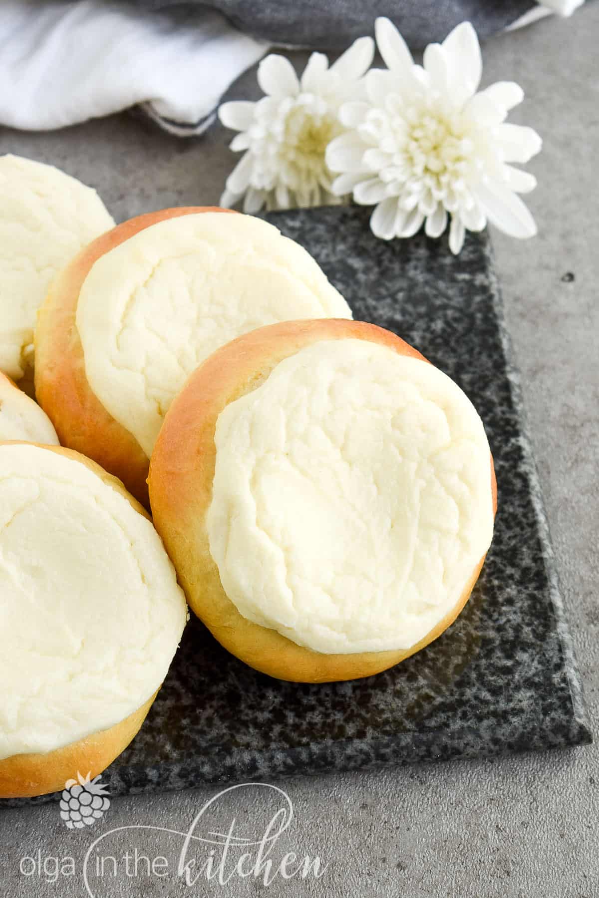 Sweet Cheese Filled Buns (Vatrushka Recipe): freezer-friendly, soft and fluffy sweet buns filled with smooth farmer’s cheese filling. | olgainthekitchen.com #vatrushka #sweetbuns #farmerscheese #olgainthekitchen #bread #ukrainianrecipe #cheesebuns