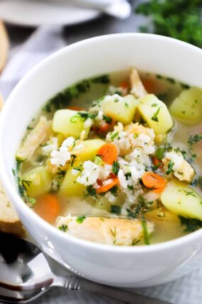 Easy Chicken and Rice Soup has simple ingredients, but it’s so comforting and hearty. It is quick and easy, loaded with fresh vegetables and rice, making it a great weeknight meal. #chickensoup #chickenricesoup #soup #olgainthekitchen #easyrecipe #dinner #potatosoup #chickenbreast #chicken