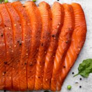 This recipe for Smoked Salmon is juicy and flaky with a simple salt, sugar and pepper cure. An easy step-by-step guide to make the best and most delicious hot Smoked Salmon at home. #smokedsalmon #salmon #olgainthekitchen #holiday #summer #homemade #appetizer