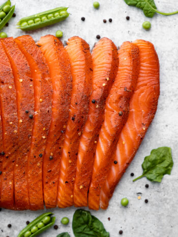 This recipe for Smoked Salmon is juicy and flaky with a simple salt, sugar and pepper cure. An easy step-by-step guide to make the best and most delicious hot Smoked Salmon at home. #smokedsalmon #salmon #olgainthekitchen #holiday #summer #homemade #appetizer